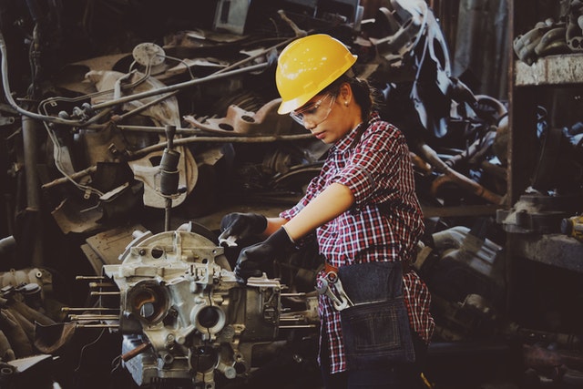 Photo by Chevanon Photography: https://www.pexels.com/photo/woman-wears-yellow-hard-hat-holding-vehicle-part-1108101/ Student loan forgiveness